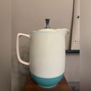 White and Teal plastic Pitcher